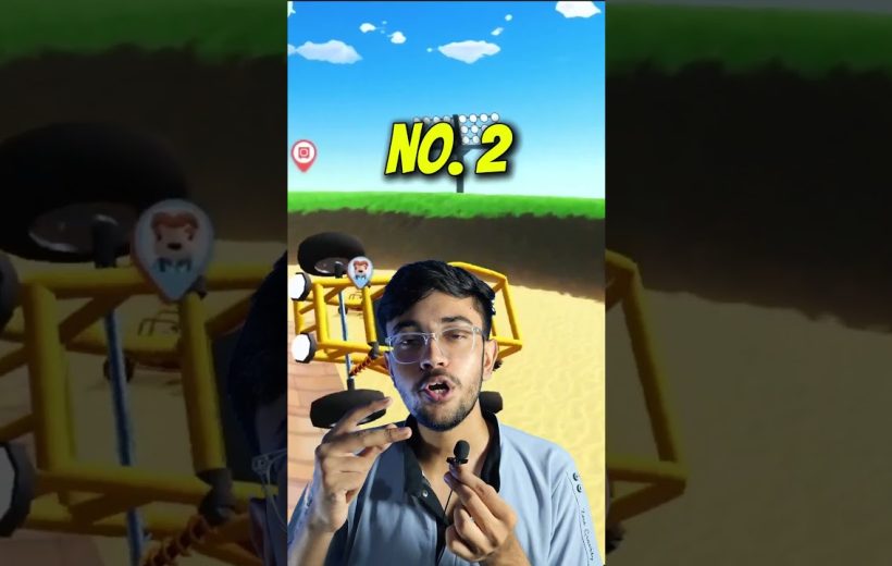 Young man demonstrating a small microphone in front of a beach-themed game screen