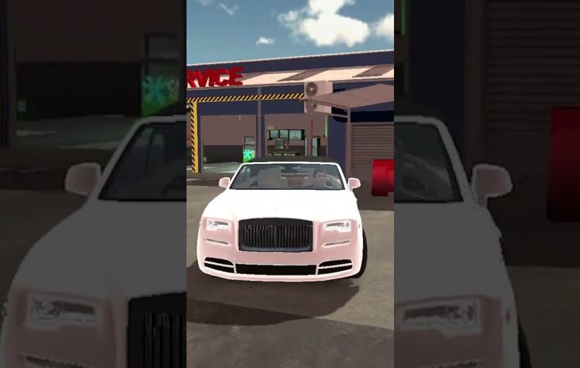 White luxury convertible parked in front of a service garage with driver inside