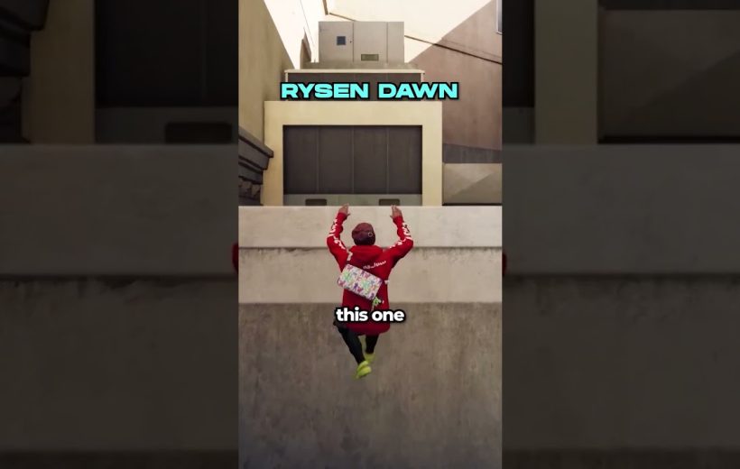 Person in red hoodie climbing a concrete wall beneath blue "RYSEN DAWN" text