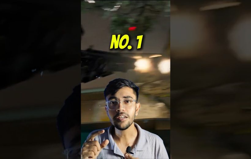 Young man speaking to camera with "NO. 1" text over blurred action background