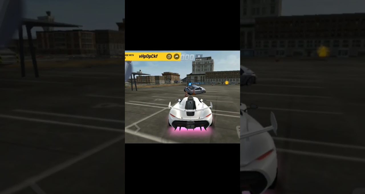 White sports car with pink underglow parked in urban lot beside another vehicle
