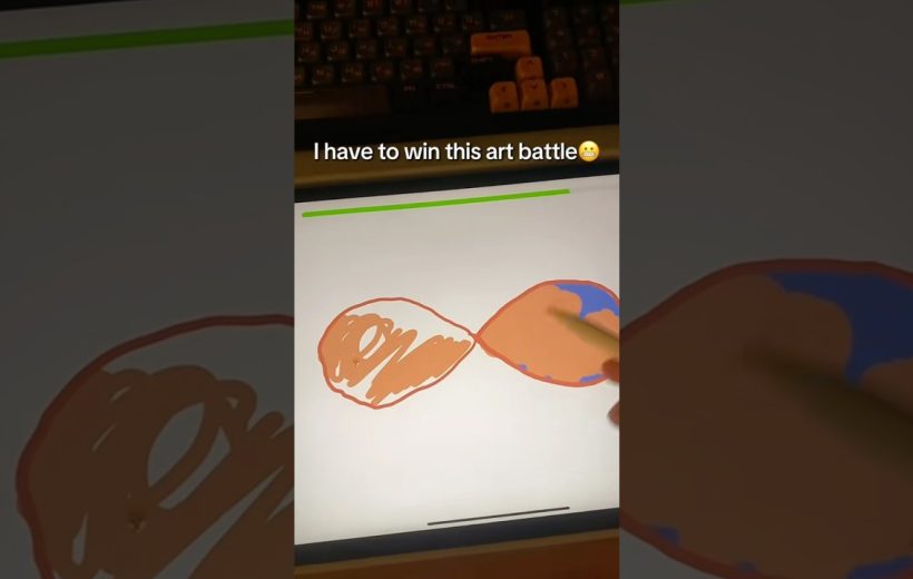 Tablet screen showing a hand drawing two connected abstract orange and blue shapes, progress bar visible