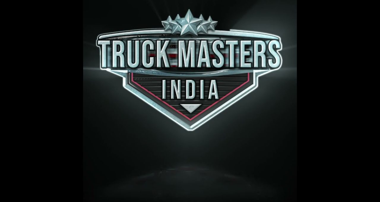 Metallic "Truck Masters India" badge logo with stars on a dark background