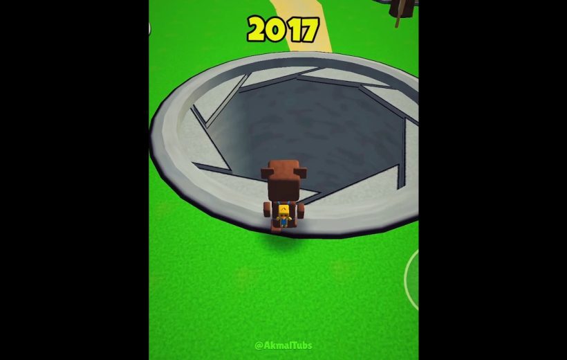 Blocky character standing at edge of a large circular trapdoor labeled 2017 on grass