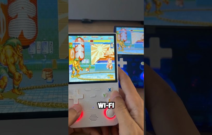 Handheld retro gaming console displaying a fighting game being played with Wi-Fi label