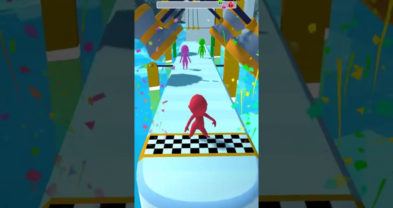 Red stick-figure character racing down an obstacle course toward two colored opponents