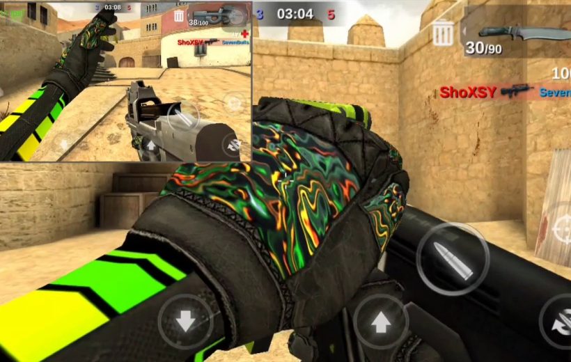 First-person shooter gameplay showing gloved hands holding a rifle in desert map
