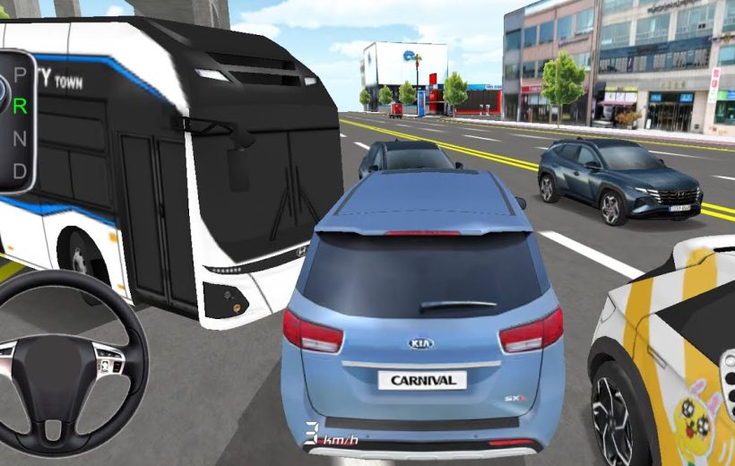 Blue Kia Carnival minivan stuck in traffic between bus and cars on city street