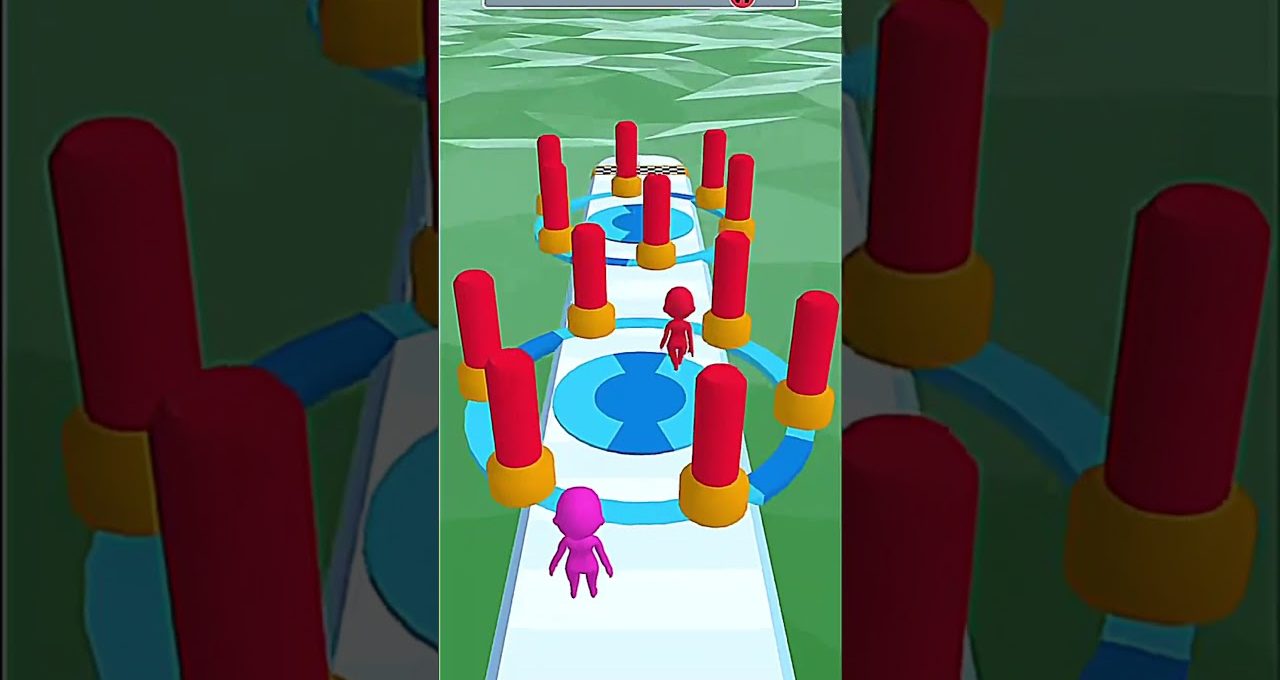 Two colorful cartoon characters running along an obstacle course with red pillars
