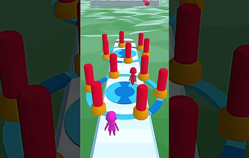 Two colorful cartoon characters running along an obstacle course with red pillars
