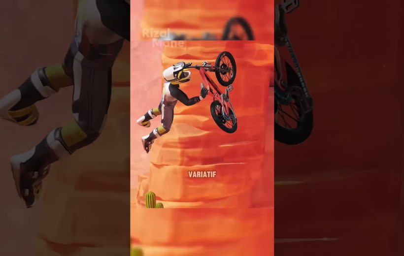 BMX rider performing a midair trick against an orange canyon background with cactus