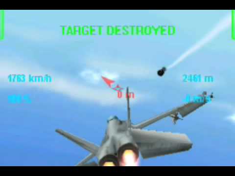 Fighter jet cockpit view tracking an enemy aircraft with "TARGET DESTROYED" message