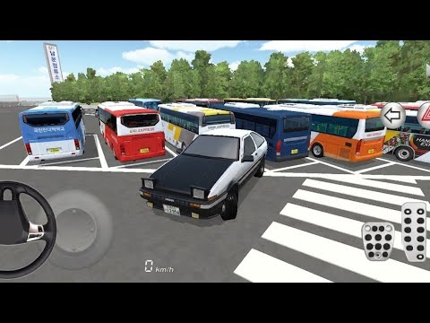 Black-and-white sports car parked in front of colorful buses in parking lot