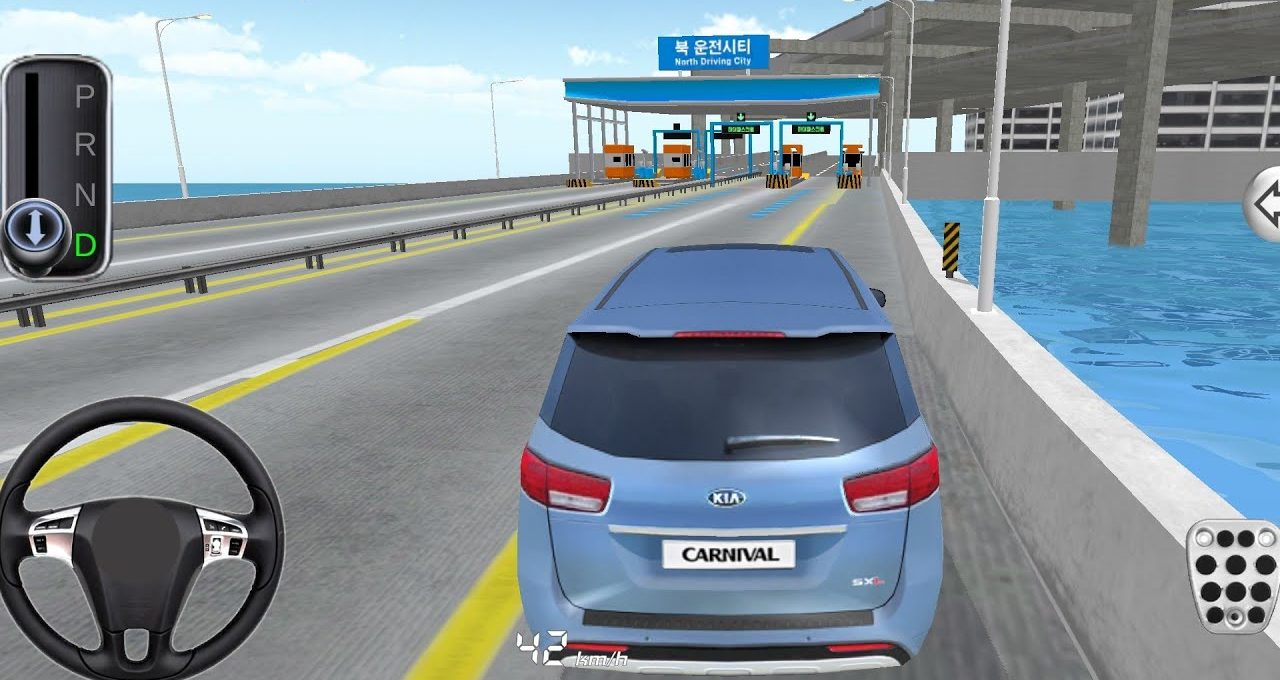 Blue Kia Carnival driving toward toll booths on a coastal elevated highway in simulation