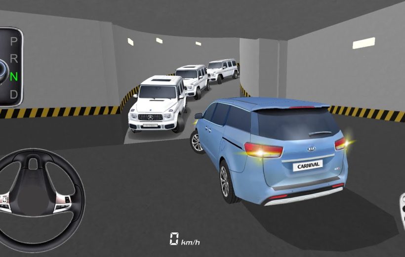 Blue Kia Carnival reversing in an underground garage toward a line of white SUVs