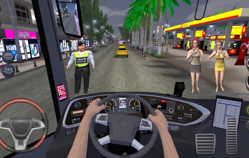 Bus driver view down city street with police officer and two pedestrians at gas station
