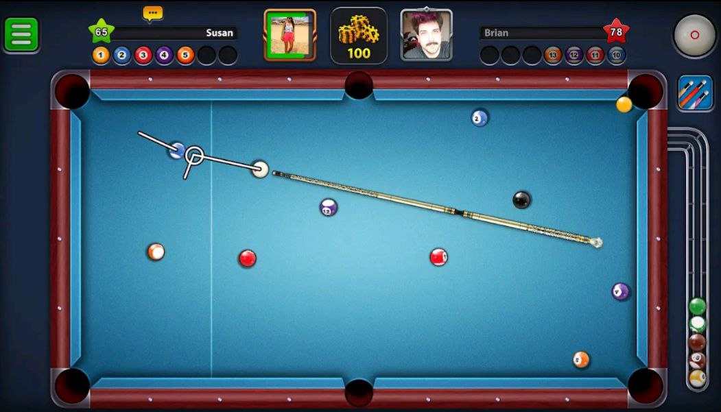 Top-down digital pool game table with cue aiming line and scattered balls.