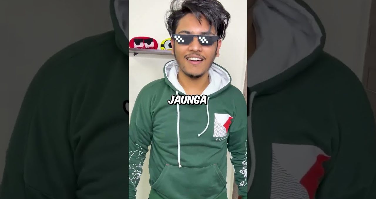 Young man smiling in green hoodie wearing pixelated "deal with it" sunglasses, text "JAUNGA"