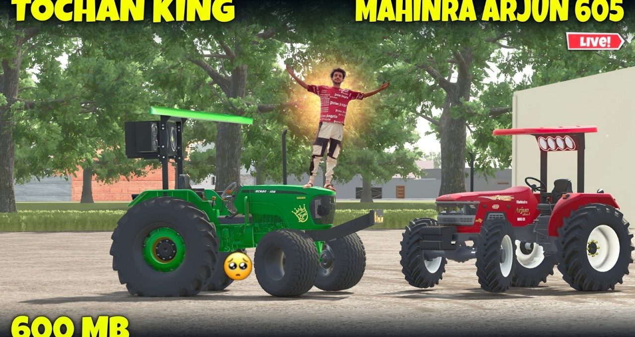 Green and red tractors parked outdoors with person glowing standing on green tractor