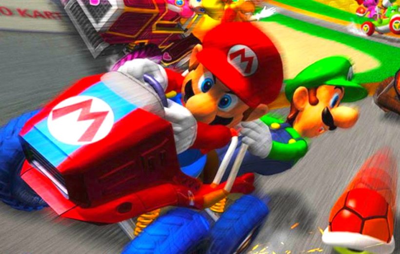 Mario and Luigi racing karts dodging a red shell on a colorful track