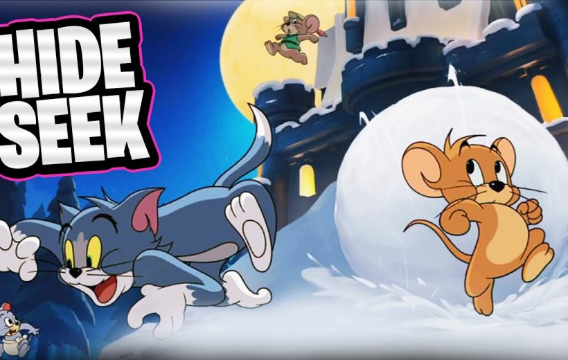 Jerry escaping in a snowball while Tom lunges toward him under moonlit castle
