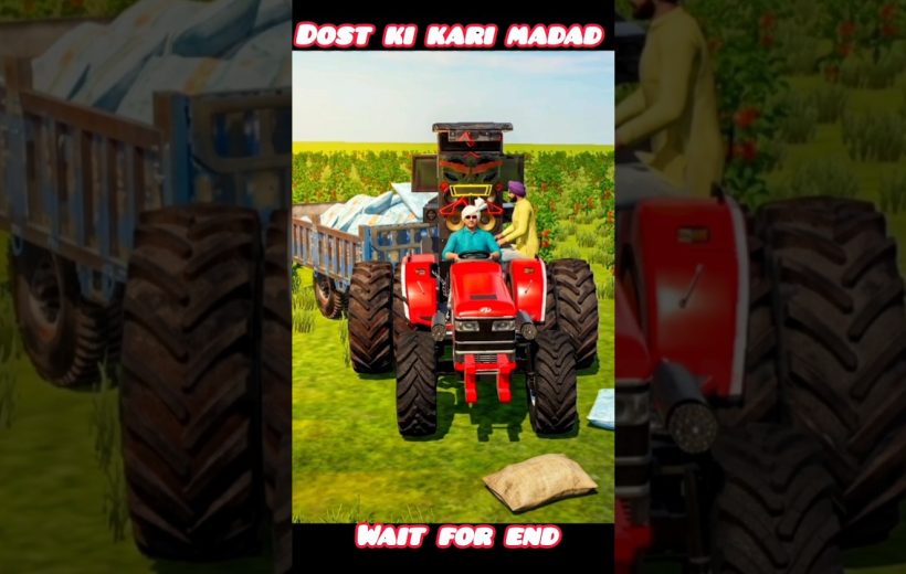 Red tractor pulling loaded trailer across a green field with two men nearby