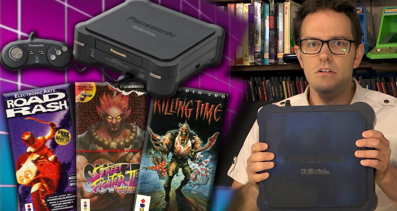 Man holding Panasonic 3DO console next to controller and vintage game boxes on shelf