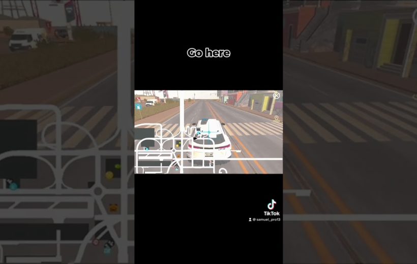 White car driving on city street with overlaid map and "Go here" text.