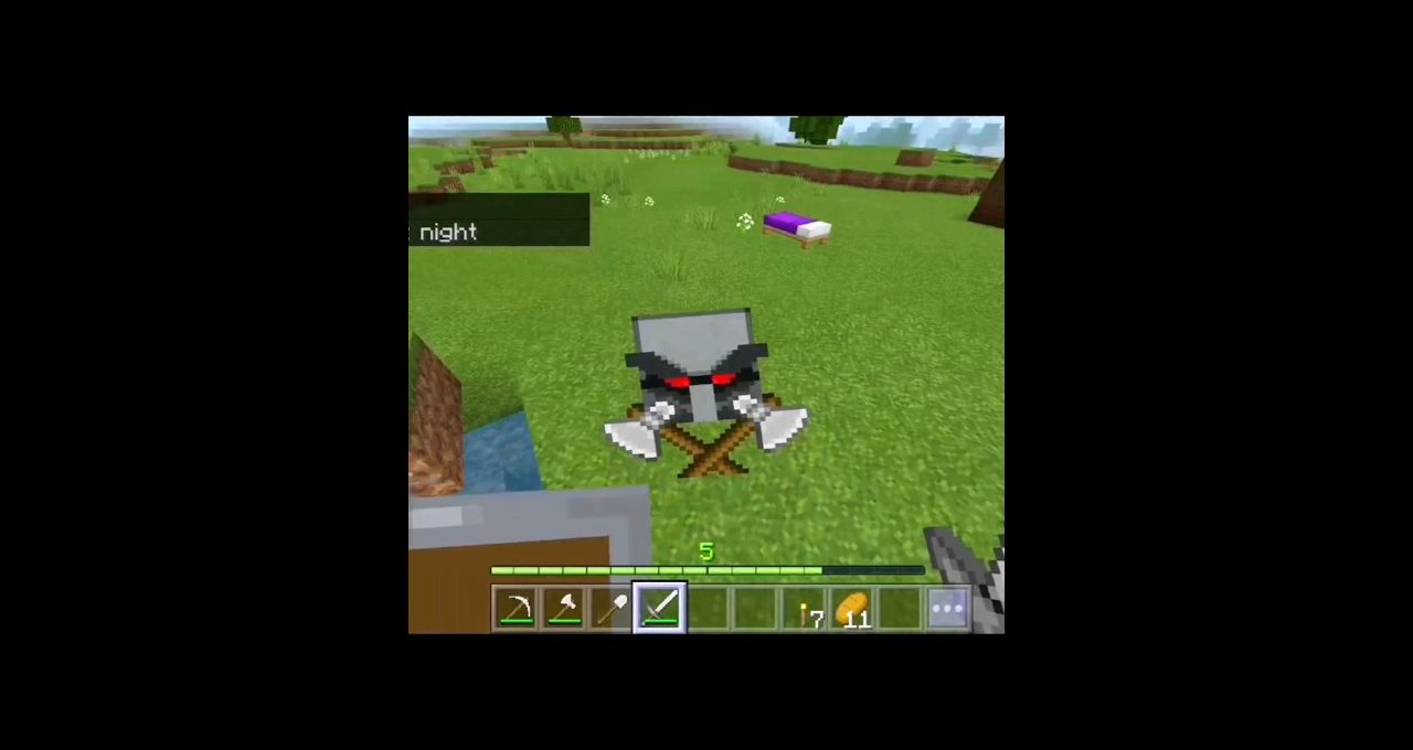 Minecraft gameplay showing a player looking at a helmet and crossed axes on grass