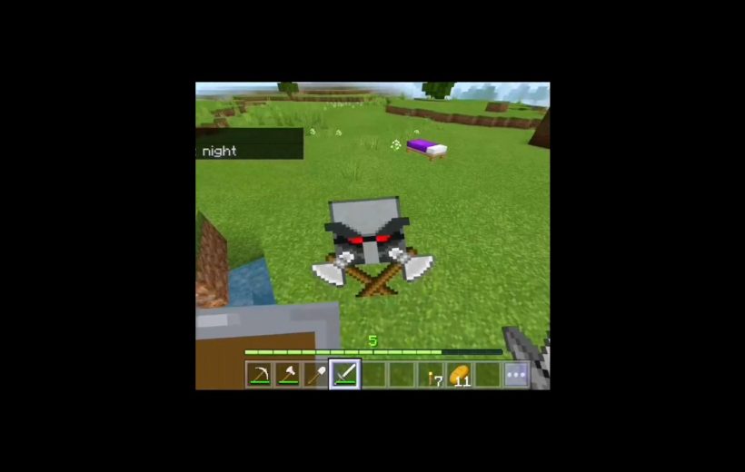 Minecraft gameplay showing a player looking at a helmet and crossed axes on grass