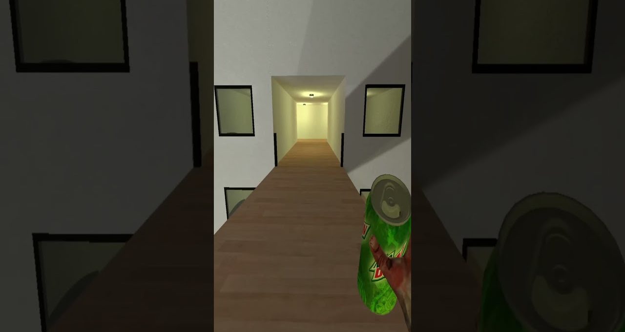 Person holding a green soda can while standing on a narrow wooden hallway bridge.
