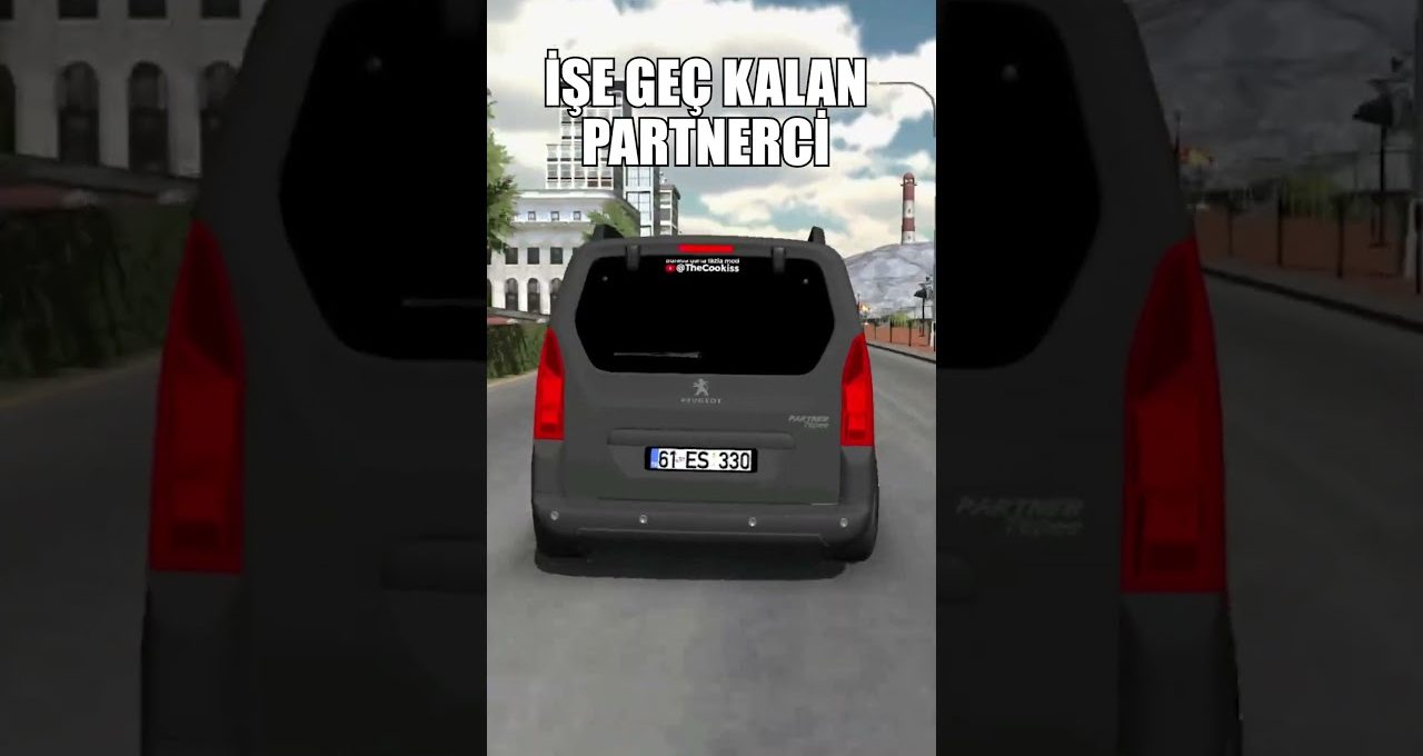 Gray Peugeot van driving down city street with Turkish license plate and caption.