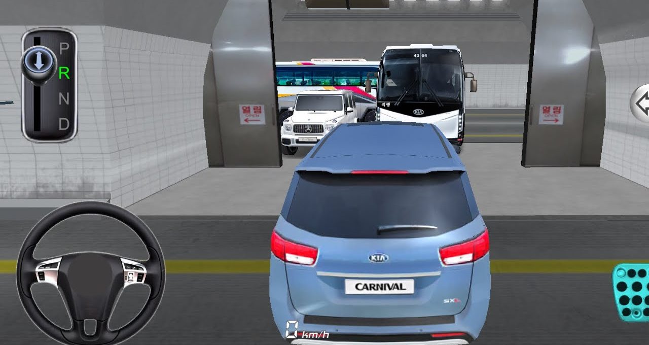 Blue Kia Carnival minivan parked inside a tiled parking garage, bus visible ahead