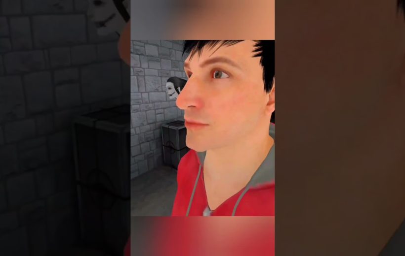 Young man in a red hoodie standing in a dim stone-walled room with mask