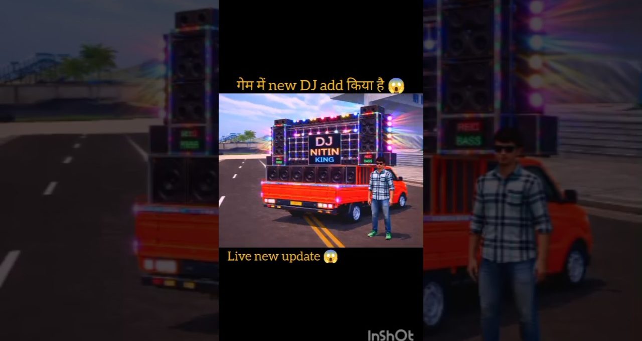 Man standing beside bright red pickup truck loaded with large DJ speakers and lights