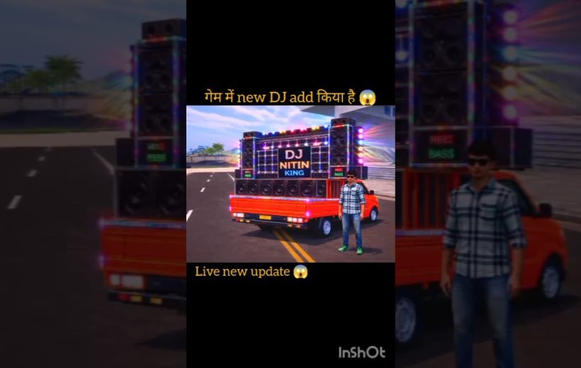 Man standing beside bright red pickup truck loaded with large DJ speakers and lights