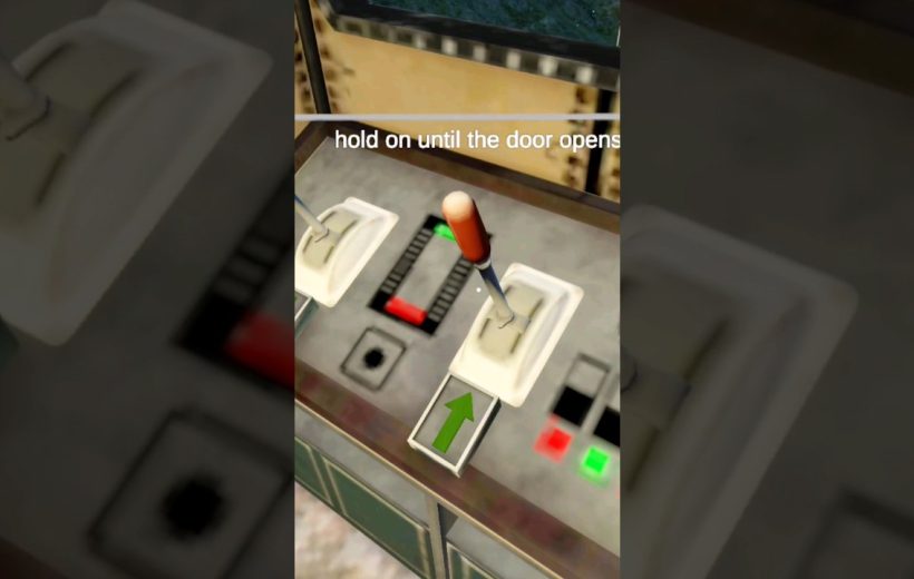 Train cab control panel with two levers and an illuminated green arrow indicator.
