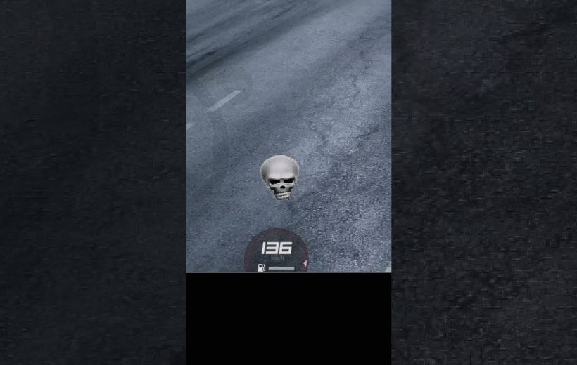 Floating skull emoji above a textured asphalt road with a small speedometer reading 136