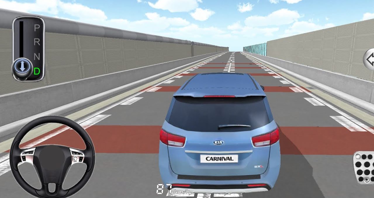 Blue Kia Carnival driving simulation view from rear on elevated test track
