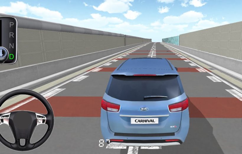 Blue Kia Carnival driving simulation view from rear on elevated test track