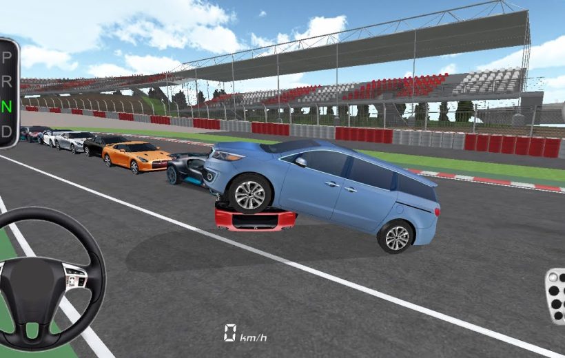 Blue minivan perched atop a red car during a chaotic racetrack lineup.