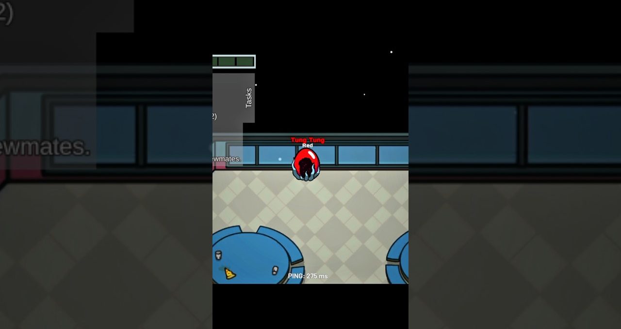 Red crewmate character standing near cafeteria tables in Among Us game lobby.