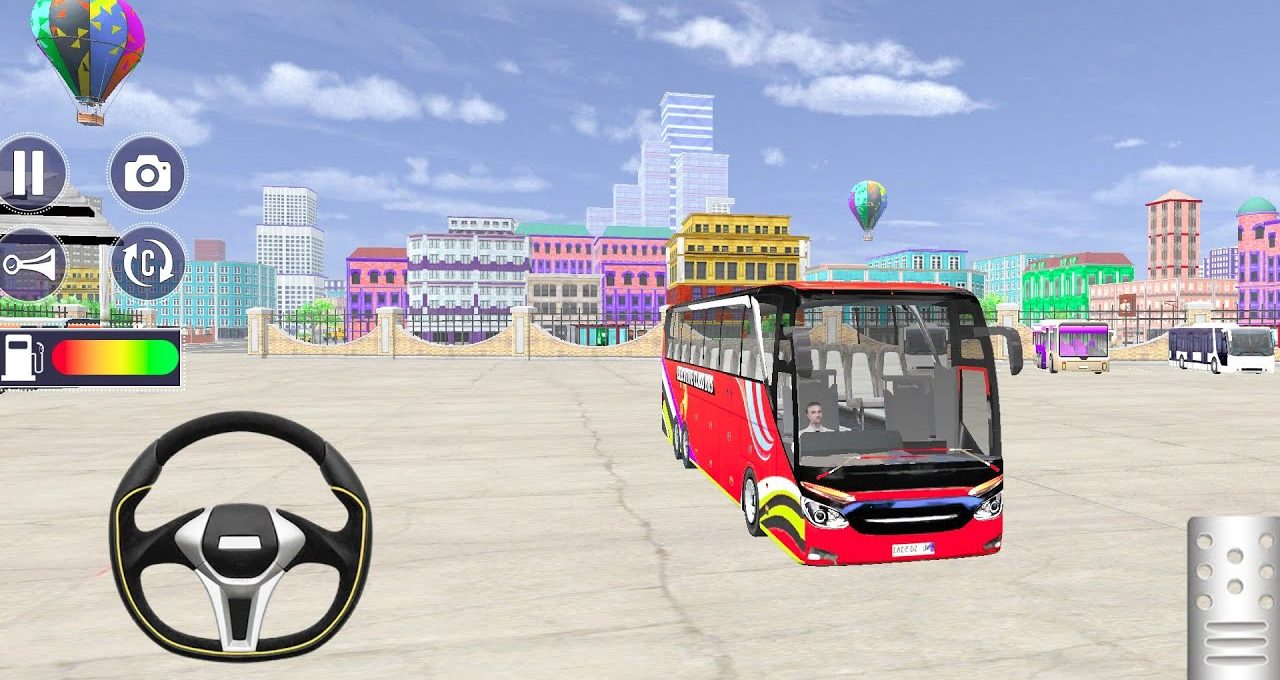 Red coach bus parked in an open city plaza with colorful buildings and balloons