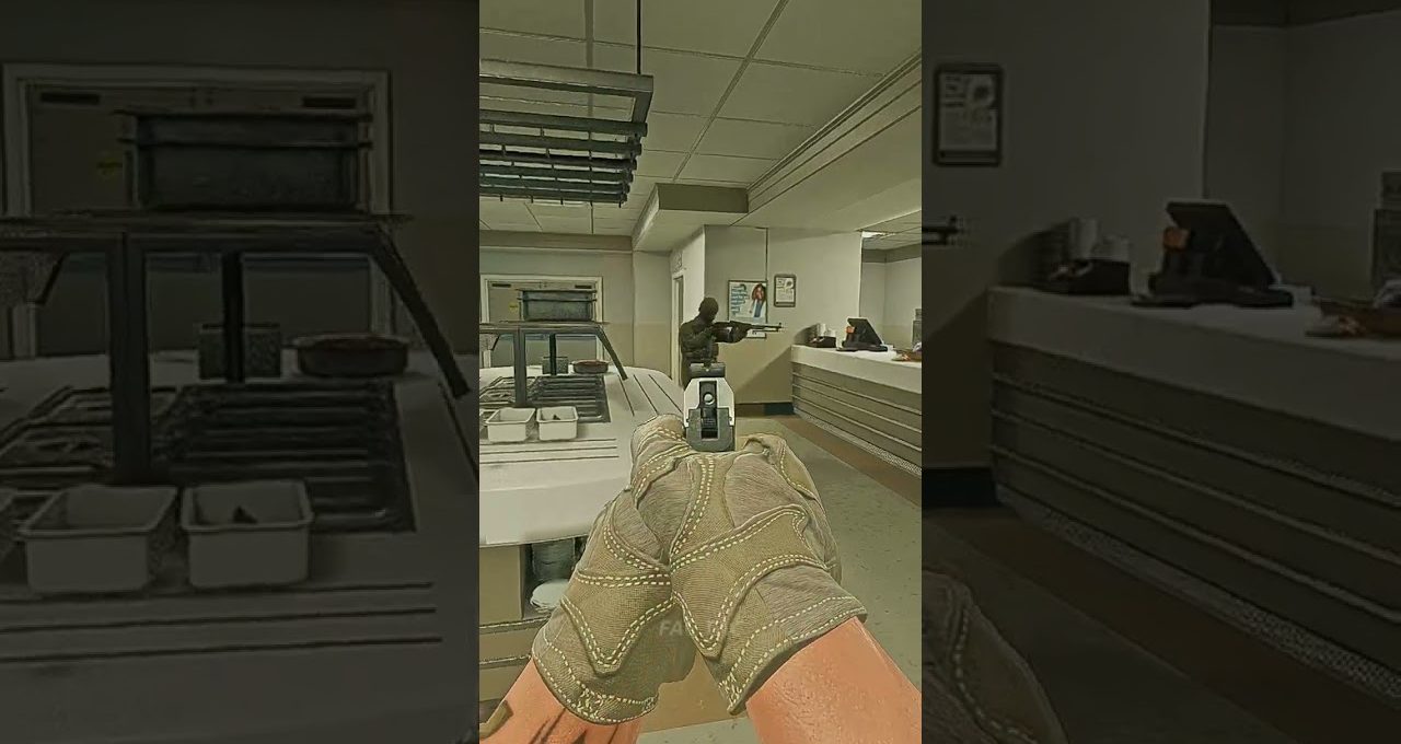 Player's gloved hands aiming a handgun down a cafeteria counter at armed guard