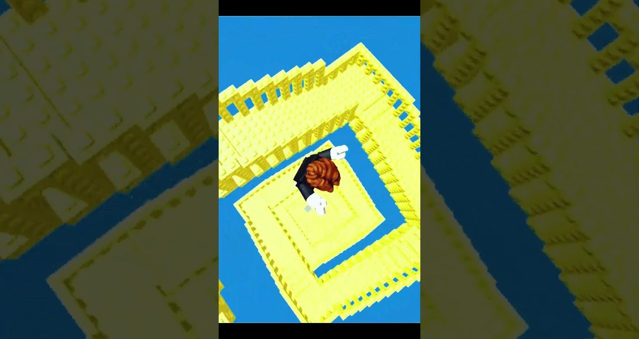Avatar falling down a spiraling yellow block tower against a bright blue sky