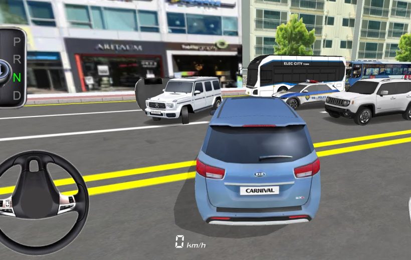 Blue Kia Carnival minivan driving past stopped SUVs, police car, and bus on street