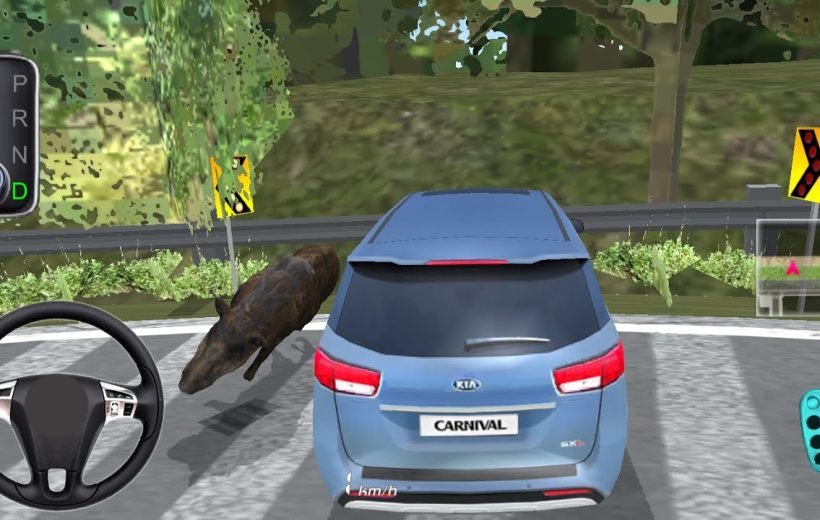 Blue Kia Carnival car on road with wild boar crossing near guardrail.
