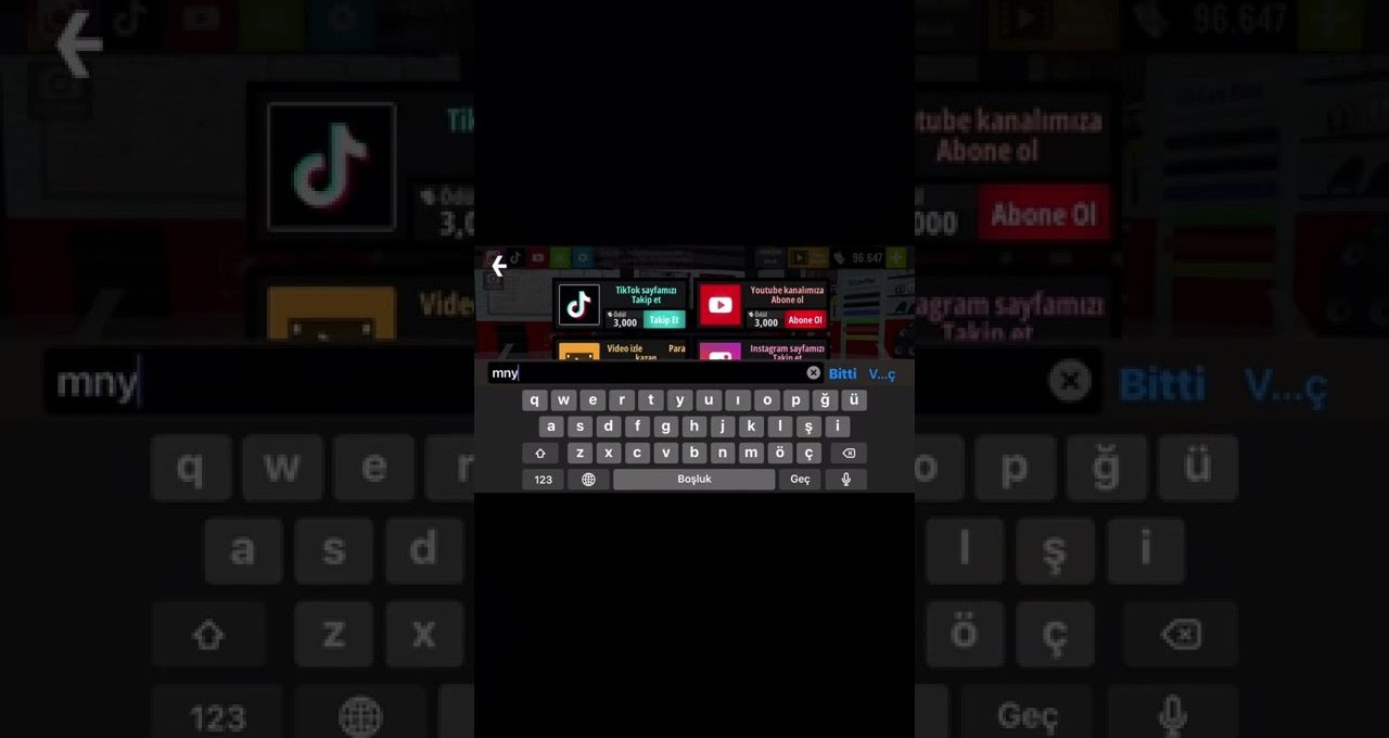 Tablet screen showing an on-screen keyboard typing "mny" with social media icons above