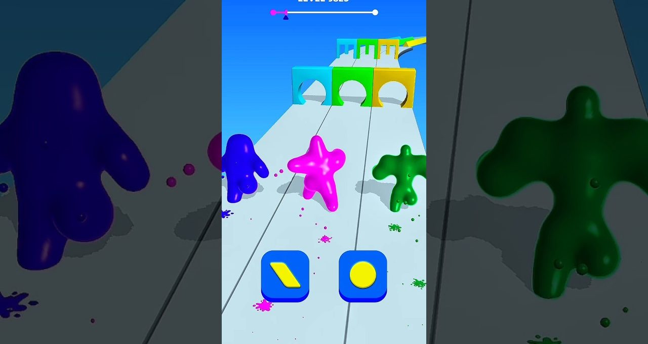 Three colorful slime characters racing down a paint-splattered obstacle runway in game.
