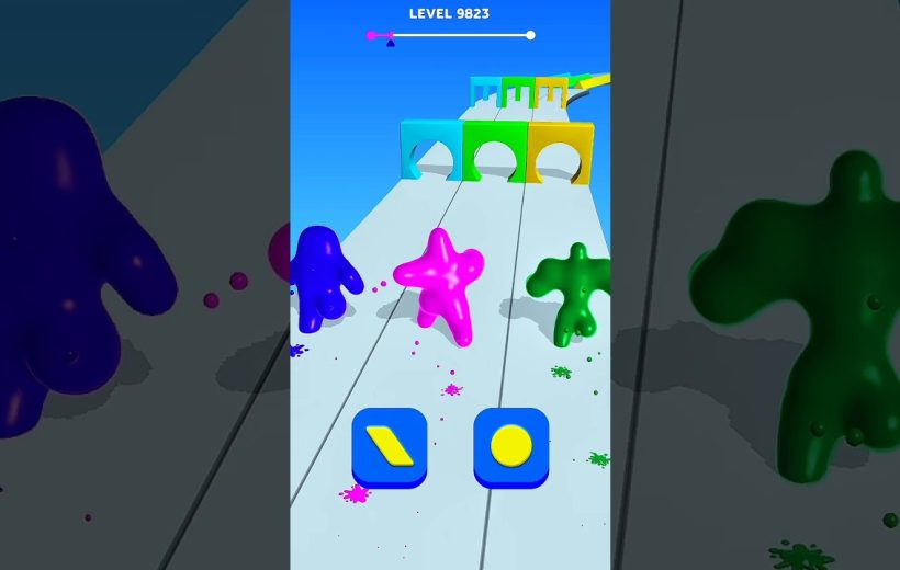 Three colorful slime characters racing down a paint-splattered obstacle runway in game.